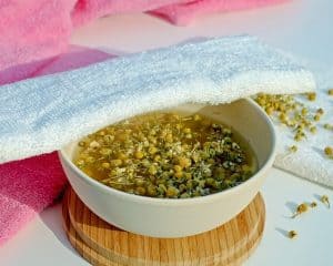 dried chamomile flowers in a bowl