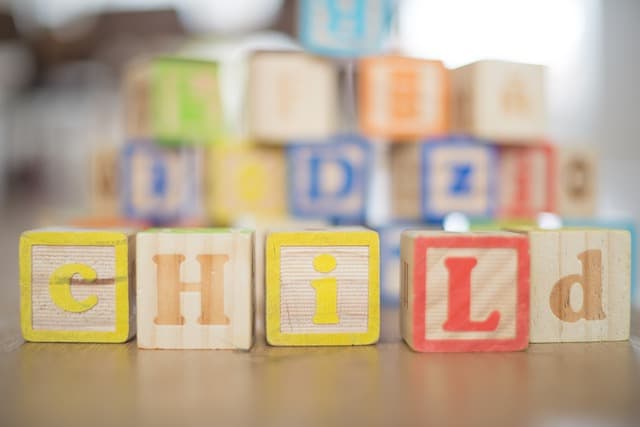 child written with toy blocks