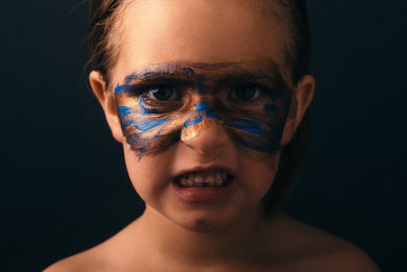 Child with warrior paint