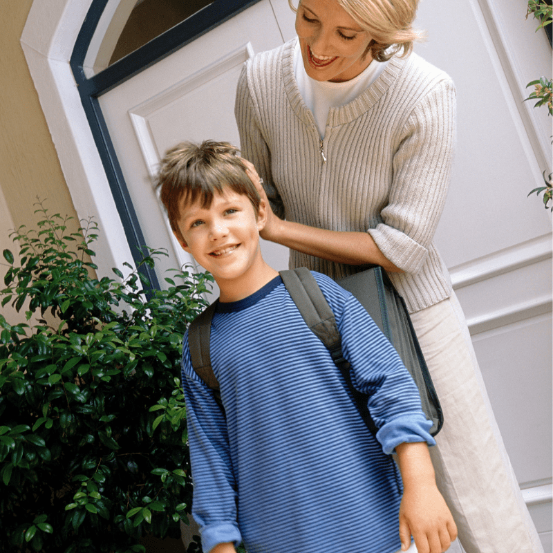 Mom with backpack leaving door with Mom