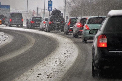 cars stuck in traffic in the winter