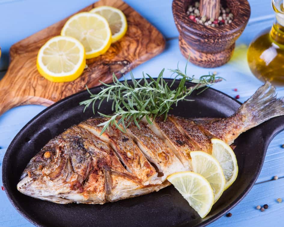 Grilled fish and lemons