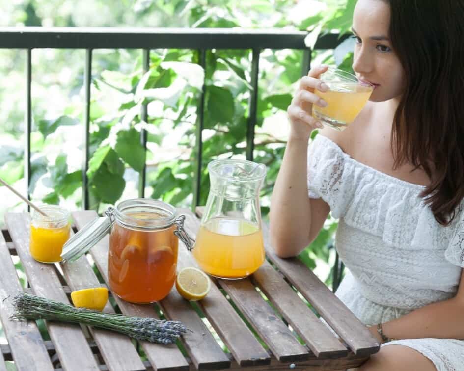 Woman drinking kombucha